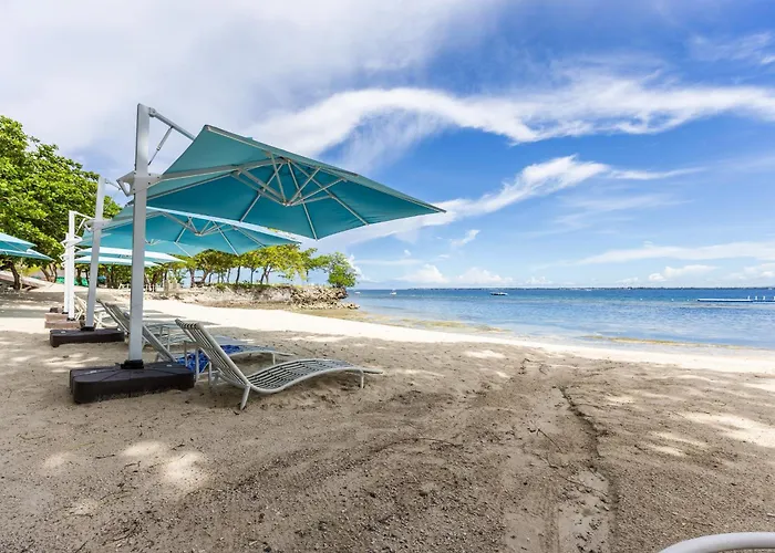 Group Comfort At Tambuli Residences 1-bedroom For Up To 6 Guests By Dominik With Pool Access & Balcony In Mactan *
